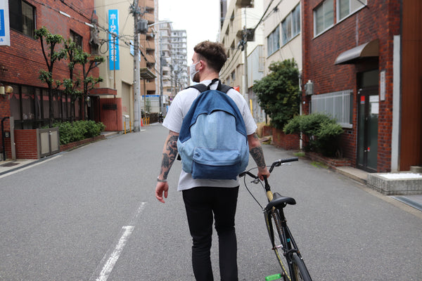 USED DENIM BACKPACK / PACKING